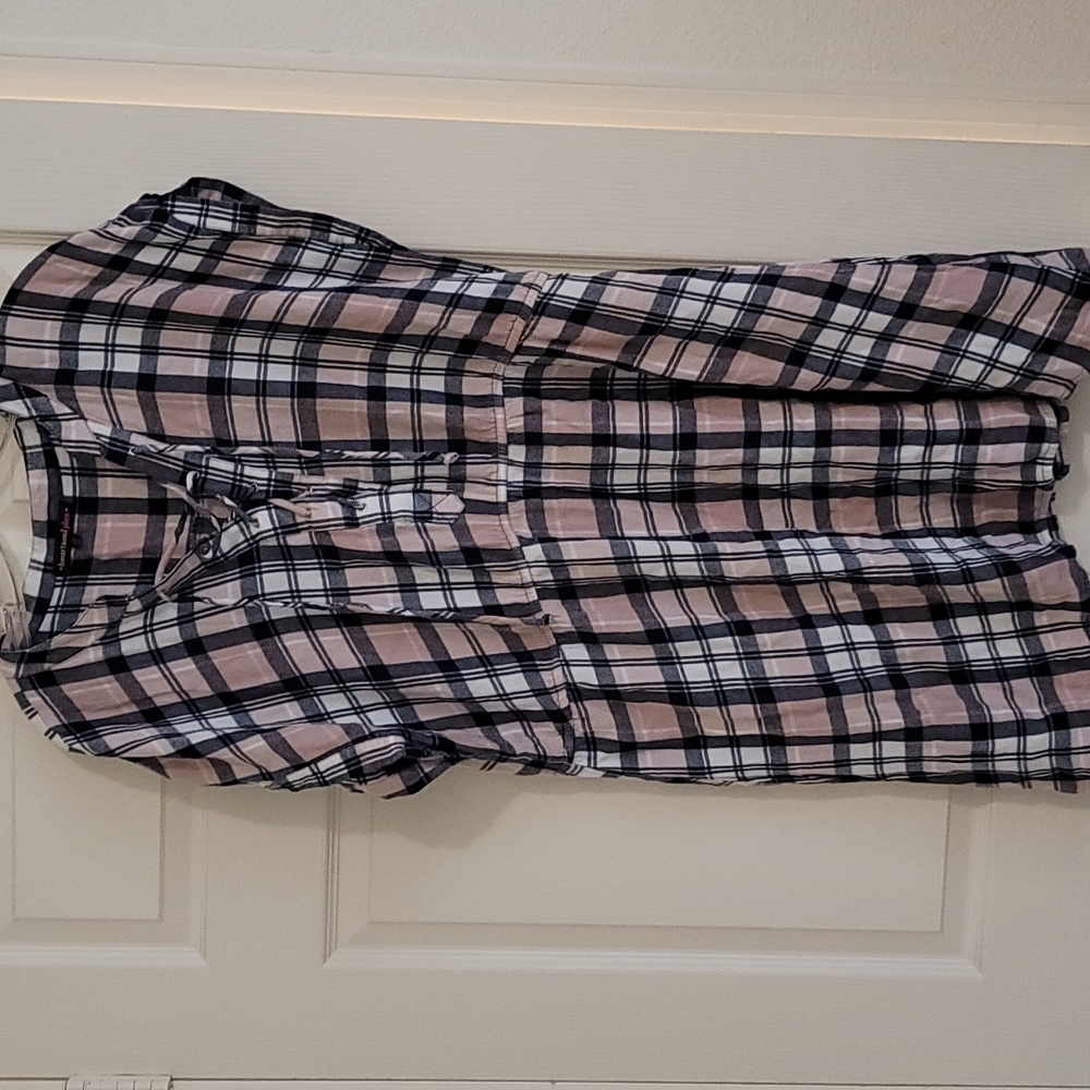 Pink and blue plaid patterned dress. Tie up front. Short sleeved.